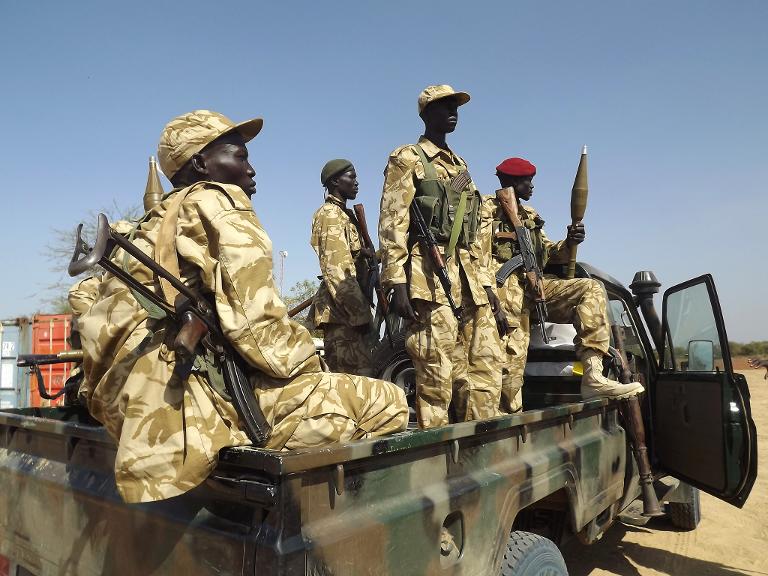 South Sudan army soldiers guard Bor airport