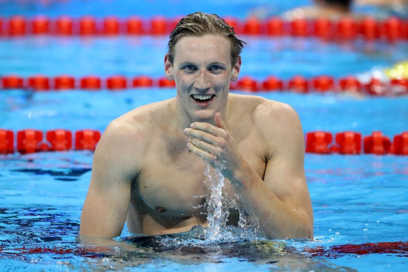 RIO DE JANEIRO BRAZIL- AUGUST 06 Mack Horton of Australia celebrates winning gold in the Final of the Men's 400m Freestyle on Day 1 of the Rio 2016 Olympic Games at the Olympic Aquatics Stadium