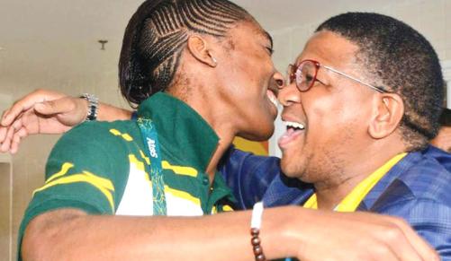 Sports Minister Fikile Mbalula hugs 800m runner Caster Semenya during a visit to the SA Athlete's village. Credit TWITTER