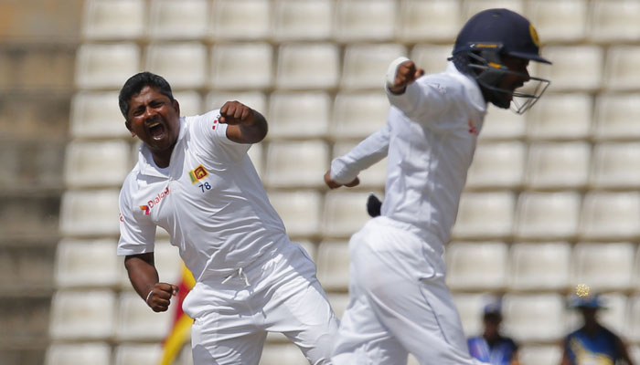 1st Test Day 2 Rangana Herath spins Sri Lanka out of trouble with four-wicket haul