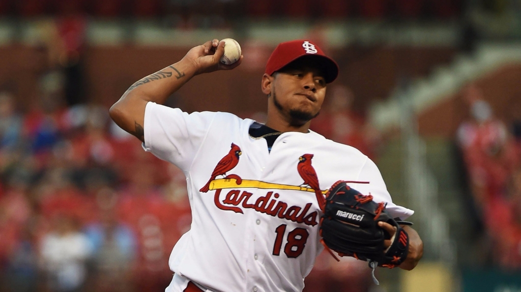 St. Louis Cardinals starting pitcher Carlos Martinez pitches to a New York Mets batter during the first inning at Busch Stadium