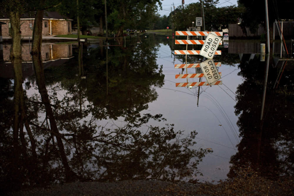 Standing water closes roads in Sorrento La. on Saturday