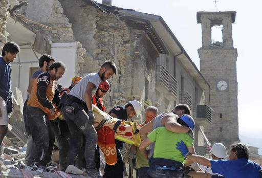 Volunteers prepare special lunch for Italian quake survivors