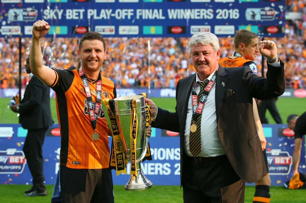 Steve Bruce right celebrates winning the play-off final in May with son Alex left Alex Livesey  Getty Images