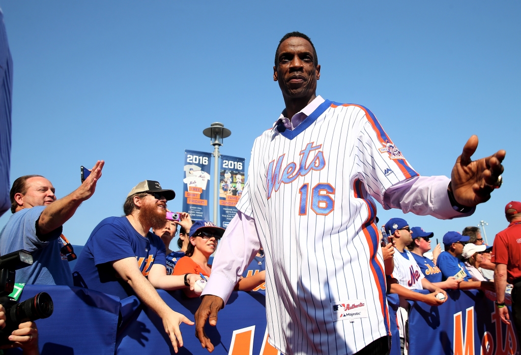 Dwight Gooden of the 1986 New York Mets greets fans on the red carpet before the game between the New York Mets and the Los Angeles Dodgers at Citi Field