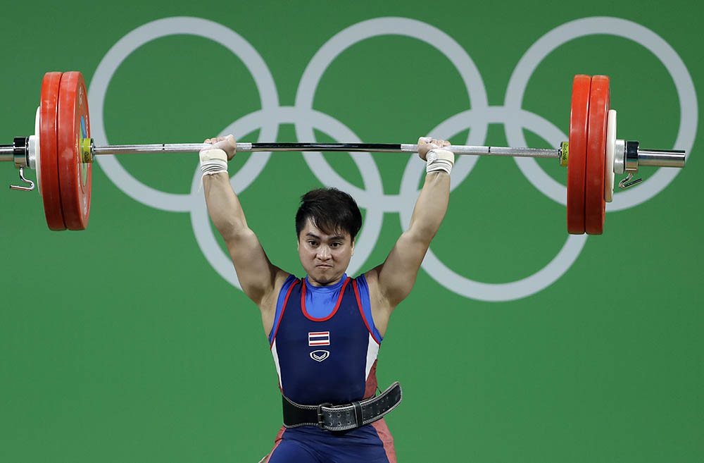 Long sets world record in winning Olympic weightlifting gold