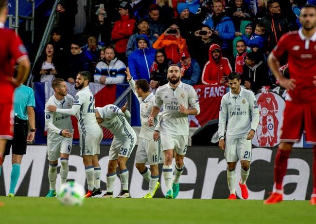 Real Madrid's Marco Asensio third left celebrates with team mates after scoring a goal against Sevilla during their Super Cup 2016 soccer match in Trondheim Norway Tuesday Aug. 9 2016