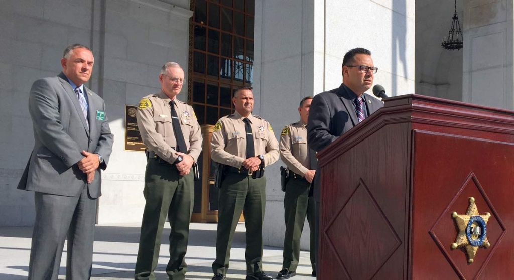 Los Angeles County Sheriff's Lt. Joe Mendoza speaks about a woman's killing and the kidnapping of her three children at a news conference at the Hall of Justice in downtown Los Angeles Wednesday Aug. 24 2016