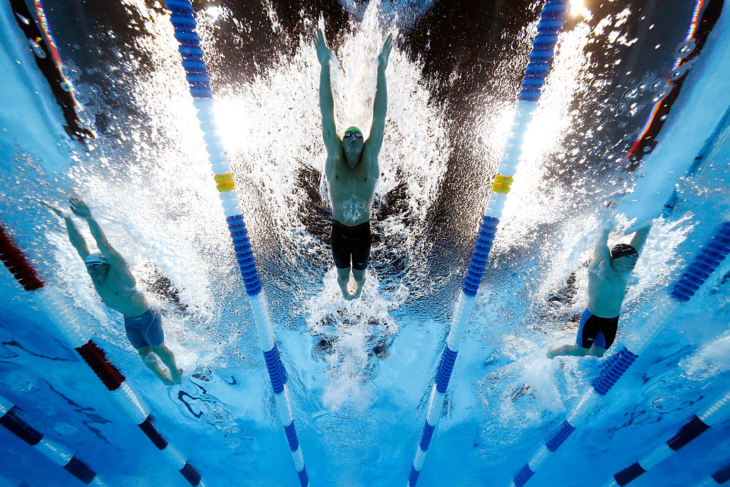 Austin Surhoff Ryan Lochte and Gunnar Bentz of the United States compete in a semi-final heat for the Men's 200 Meter Individual Medley during Day Five of the 2016 U.S. Olympic Team Swimming Trials at Century Link Center