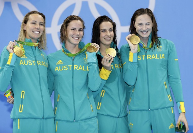 Australia's Emma McKeon left Brittany Elmslie second right Bronte Campbell second left and Cate Campbell right