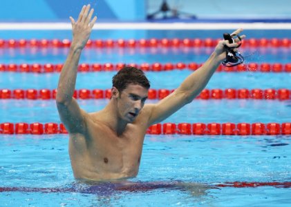 2016 Rio Olympics- Swimming- Final- Men's 4 x 200m Freestyle Relay Final- Olympic Aquatics Stadium- Rio de Janeiro Brazil- 09/08/2016. Michael Phelps of USA reacts after his team won the gold medal.  REUTERS  Stefan Wermuth