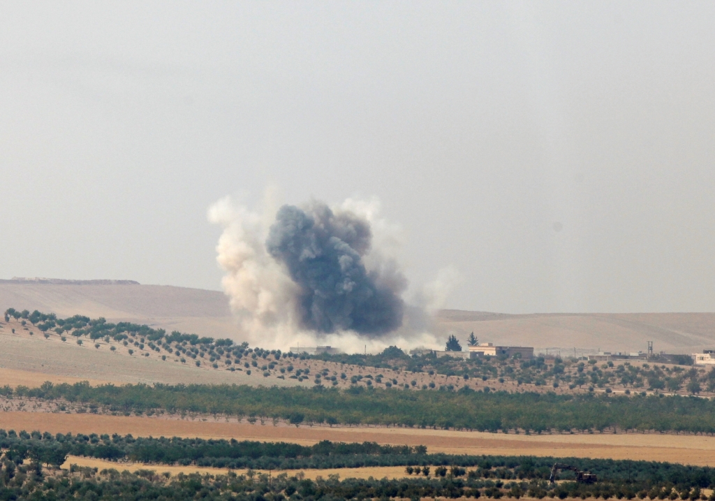 Smoke rises from the Syrian border town of Jarablus