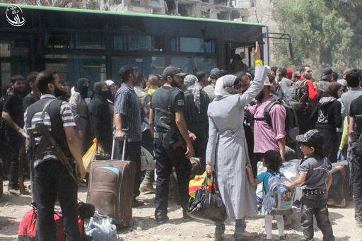 Rebels, civilians to evacuate long-besieged Damascus suburb