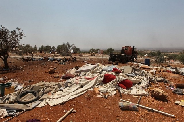 Syrian air strikes ‘hit displaced people’s camp’ near Aleppo