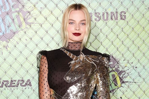 Actress Margot Robbie attends the world premiere of'Suicide Squad at The Beacon Theatre