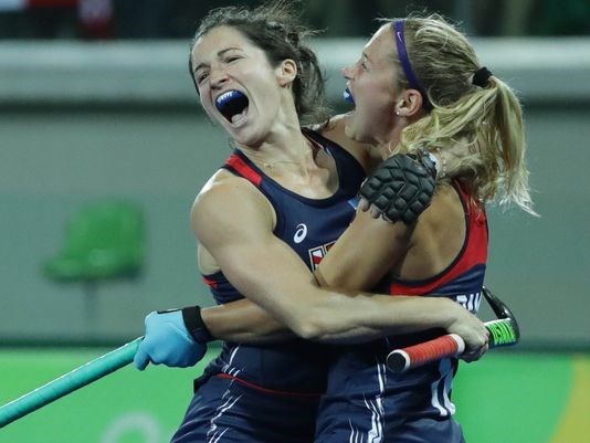 Team USA's Michelle Vittese celebrates with Katie Bam after scoring a goal against Great Britain