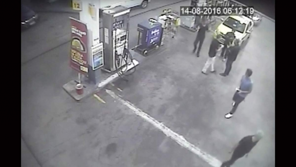 In this Sunday Aug. 14 2016 frame from surveillance video released by Brazil Police swimmers from the United States Olympic team appear with Ryan Lochte right at a gas station during the 2016 Summer Olympics in Rio de Janeiro Brazil