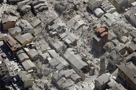 Aerial view of Amatrice in central Italy Wednesday Aug. 24 2016 as it appears after a magnitude 6 quake struck at 3:36 a.m. and was felt across a broad swath of central Italy including Rome where residents of the capital felt a long swayin