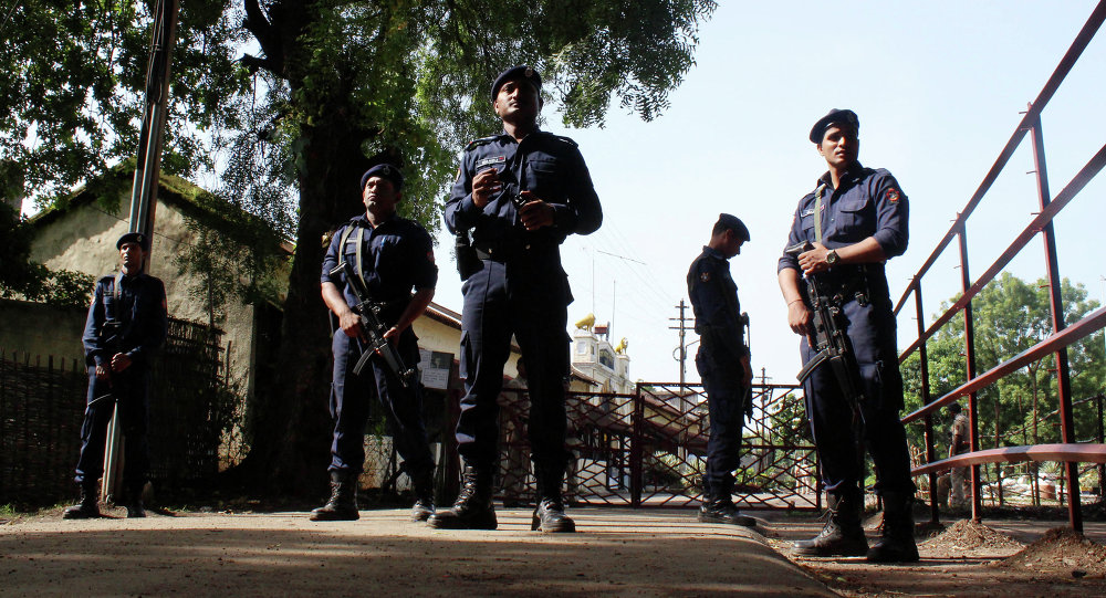 Indian police personnel stand alert at the entrance to Central Jail in Nagpur