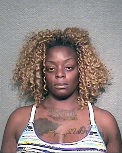 Houston Police Department shows Sheborah Latrice Thomas. Thomas who calmly told an acquaintance that she had drowned her two children in a bathtub has been charged in their deaths and was being held without bon