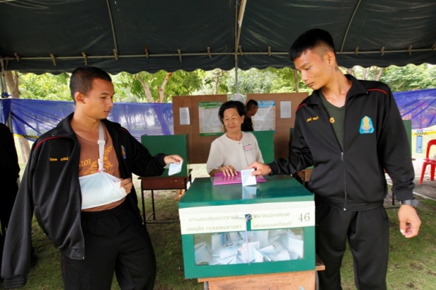 Thai soldiers cast their ballots during a constitutional referendum vote in Bangkok Thailand