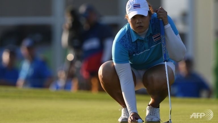 Thailand's Ariya Jutanugarn putts in the women's individual stroke play at the Olympic Golf course in Rio.
   
 

  Enlarge  Caption