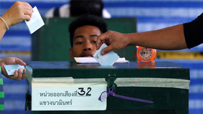 Thais vote on new constitution that could dilute democracy