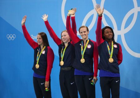 Aug 13 2016 Rio de Janeiro Brazil Kathleen Baker  Lilly King  Dana Vollmer and Simone Manuel celebrate after winning the gold medal in the women's 4x100m medley relay final in the Rio 2016 Summer Olympic Games at Olympic Aqua