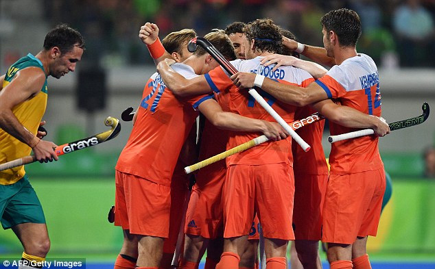 The Holland players celebrate during their shock 4-0 victory over favourites Australia