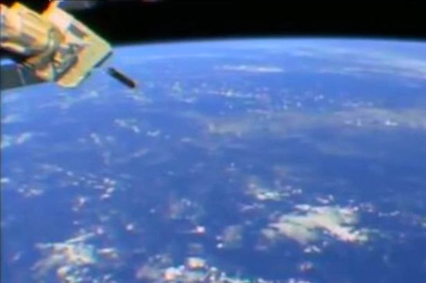 International Space Station camera films mystery missile shaped object in orbit