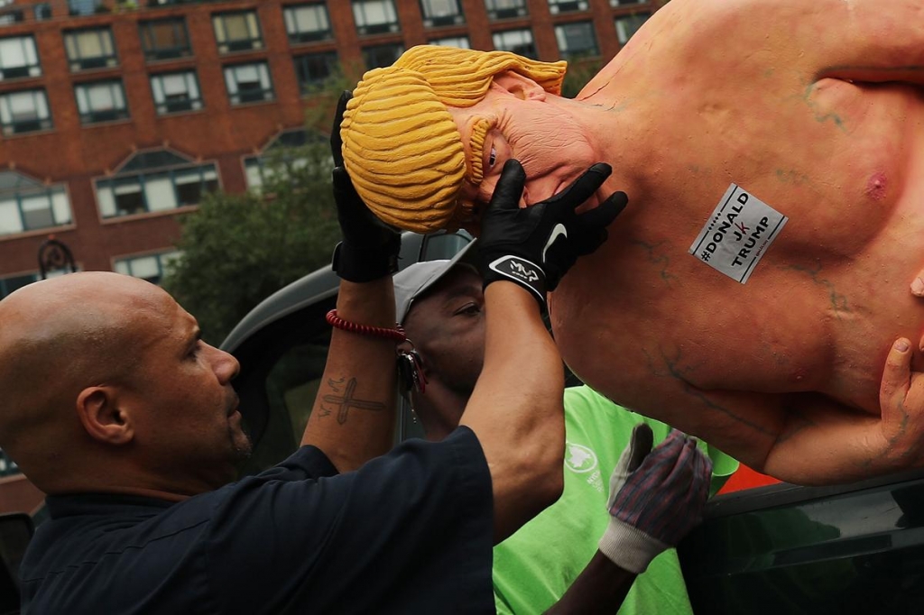 The NY Parks Department took the illegally-placed statue down but not before copious selfies were taken by the public