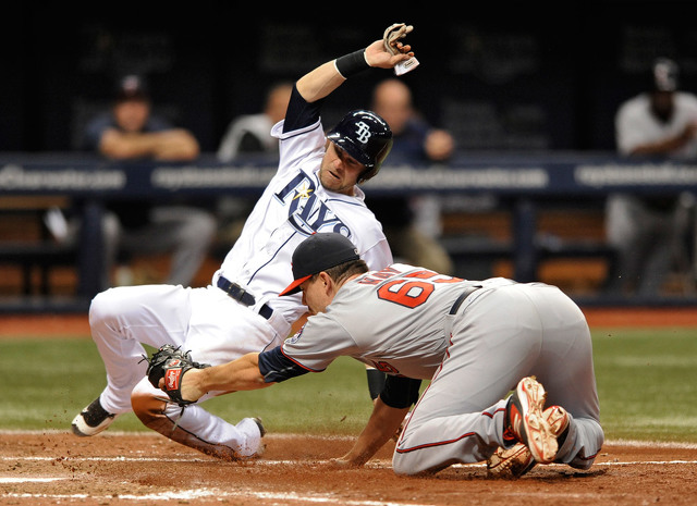 The Rays Nick Franklin scored on a wild pitch by the Twins Trevor May during Saturday's game. Click