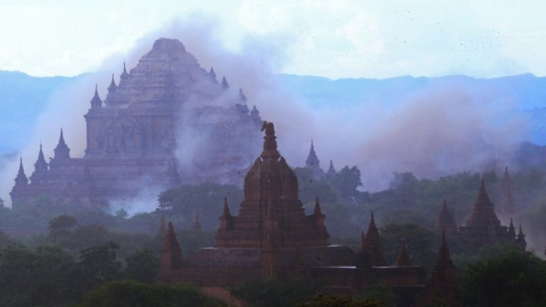 The ancient Sulamuni temple is seen shrouded in dust after a 6.8 magnitude earthquake hit Bagan on Aug 24 2016