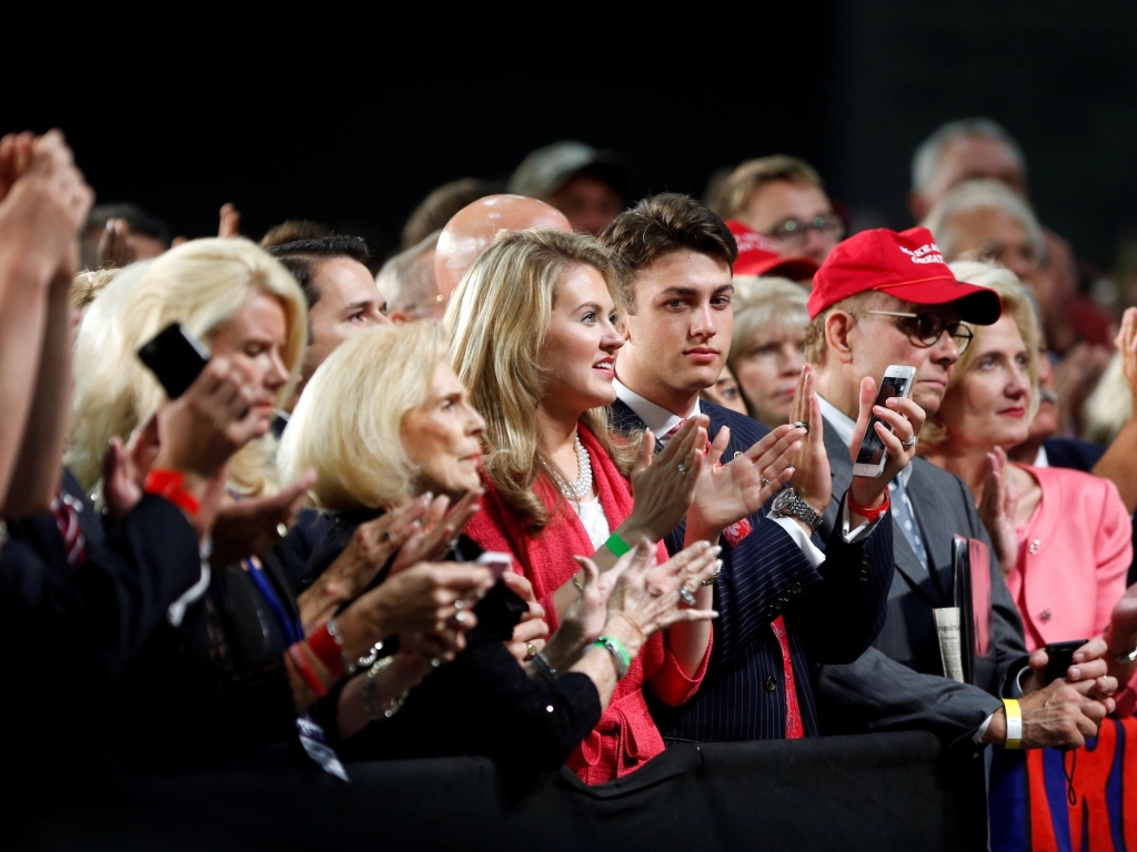 The audience reacts as Republican presidential candidate Donald Trump delivers a campaign speech in Charlotte N.C. Thursday