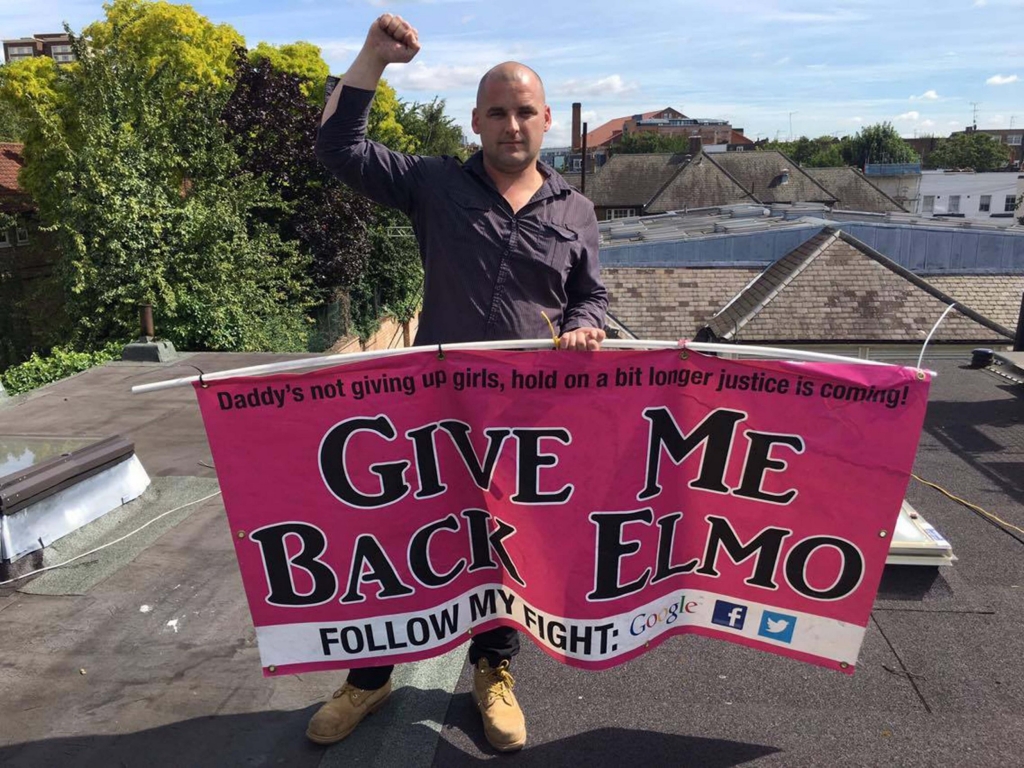 PIC FROM MERCURY PRESS Two family law activists are believed to be staging a protest on the roof of Jeremy Corbynís north London home. Protestors Bobby Smith and Mart