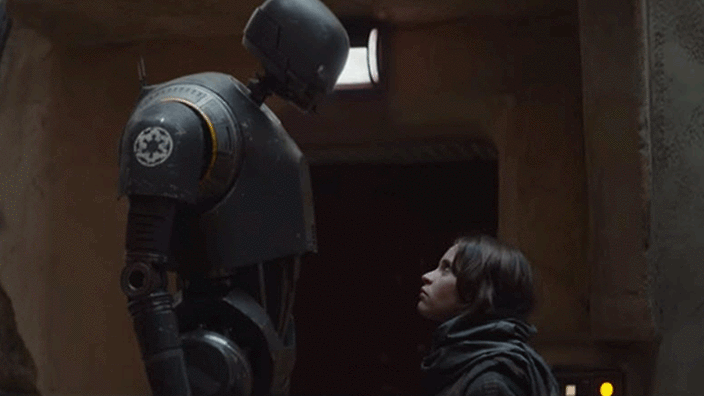 The droid K-2SO stares down Felicity Jones's character Jyn Erson in the 'Rogue One&#039 trailer