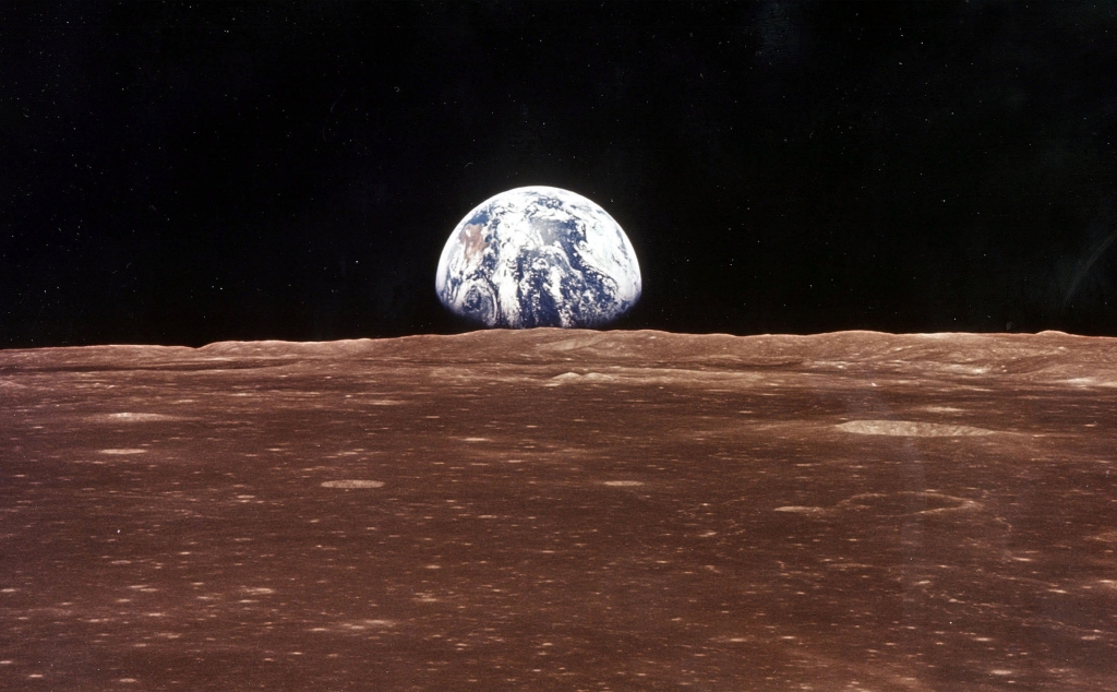 The earth as seen from the Apollo 11 Command Module above the surface of the moon