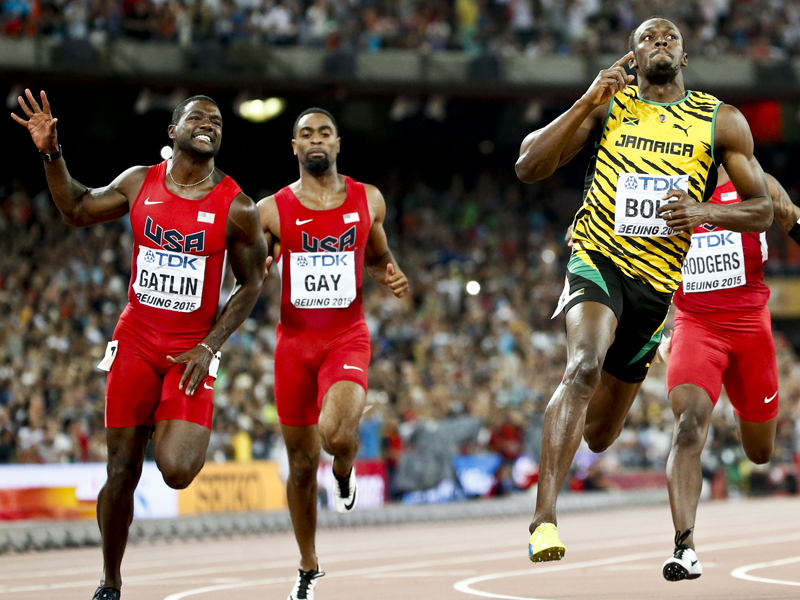 Left to right Justin Gatlin and Tyson Gay from the U.S. and Usain Bolt of Jamaica compete in the men's 100m final during the 15th IAAF World Championships at the National Stadium in Beijing China