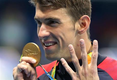 United States&#039 Michael Phelps celebrates winning the gold medal in the men's 200-meter individual medley during the swimming competitions at the 2016 Summer Olympics Thursday Aug. 11 2016 in Rio de Janeiro Brazil