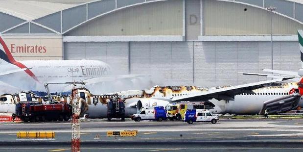 The top of the Emirates plane was completely destroyed by fire after emergency landing