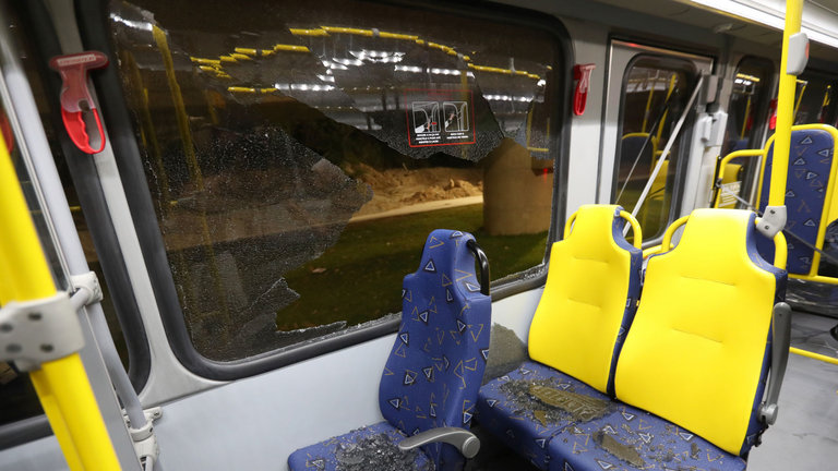 The windows of a media bus were damaged by stones on Tuesday evening