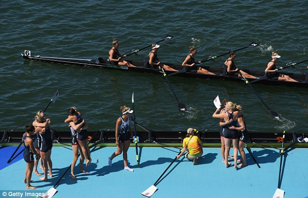 The women's coxed eight celebrate a silver medal in the women's coxed eights