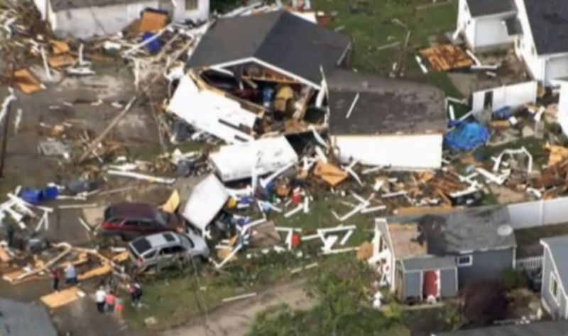 This image made from a video provided by WTHR 13 shows damage to homes after a tornado in Kokomo Ind. Wednesday