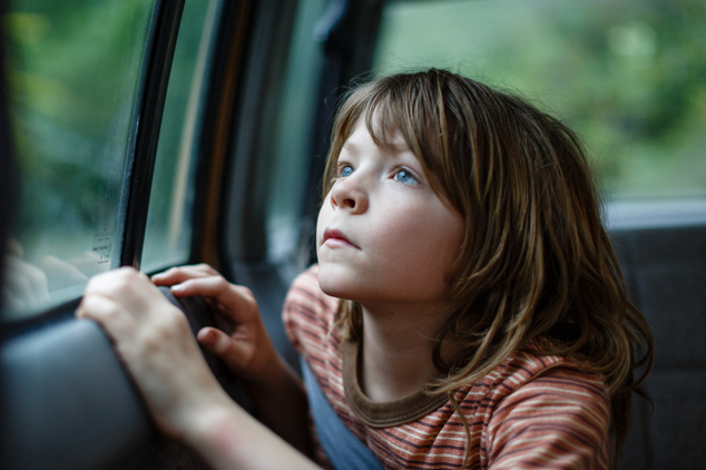 This image released by Disney shows Oakes Fegley in a scene from'Pete's Dragon