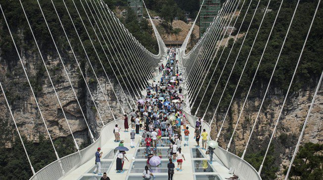 World’s highest and longest glass bridge opens in China