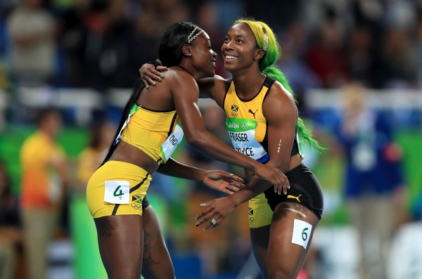 Thompson left celebrates with compatriot Shelly Ann Fraser-Pryce