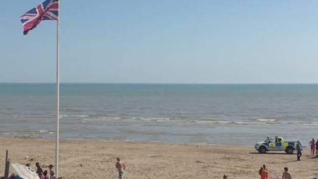 Three people have been pulled from the water at Camber Sands