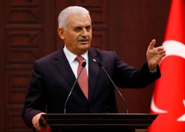 Turkish Prime Minister Binali Yildirim addresses the media in Ankara