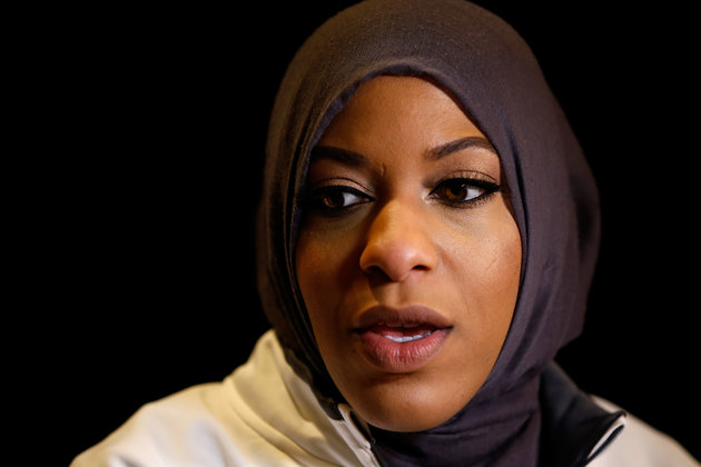 Todd Warshaw via Getty Images
Ibtihaj Muhammad addresses the media