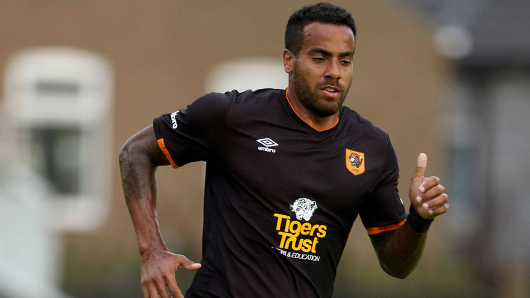 Tom Huddlestone has given his support to Mike Phelan